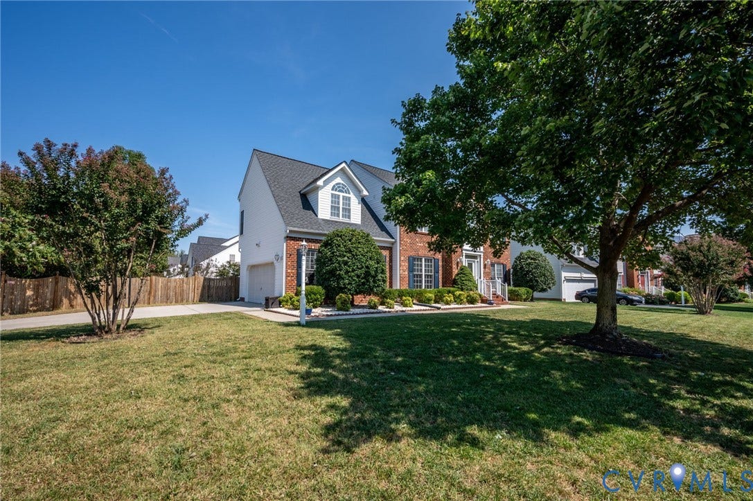 10808 Pruett Lane, Henrico, VA 23059 Brick facade with white siding and a dormer window, on corner lot