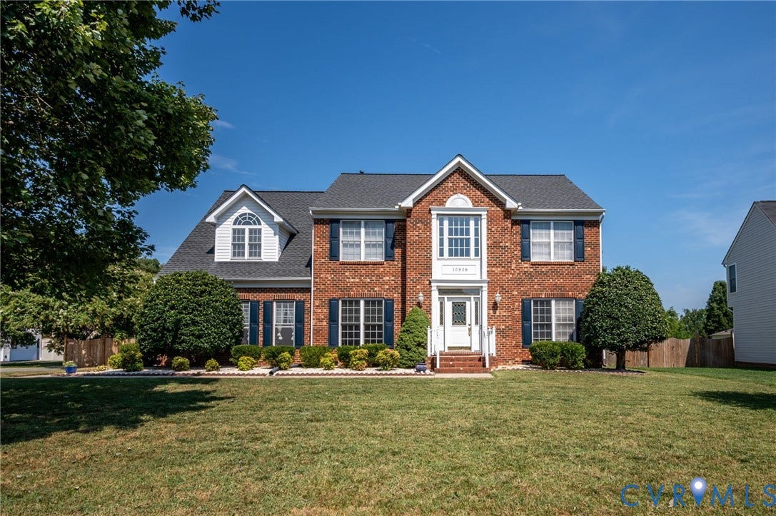 10808 Pruett Lane, Henrico, VA 23059 Brick facade with dark shutters, gabled roofline, and white trim accents