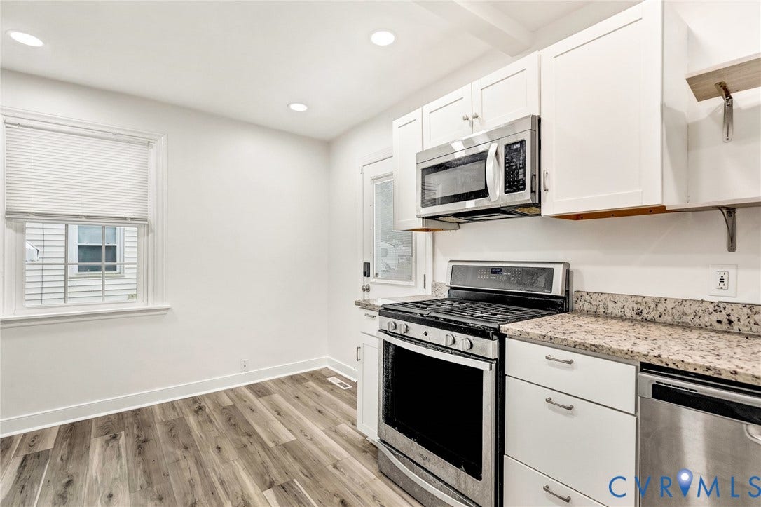 3504 Meadowbridge Road, Richmond, VA 23222 White cabinetry, stainless steel appliances, granite countertops, LVP flooring, and recessed lighting