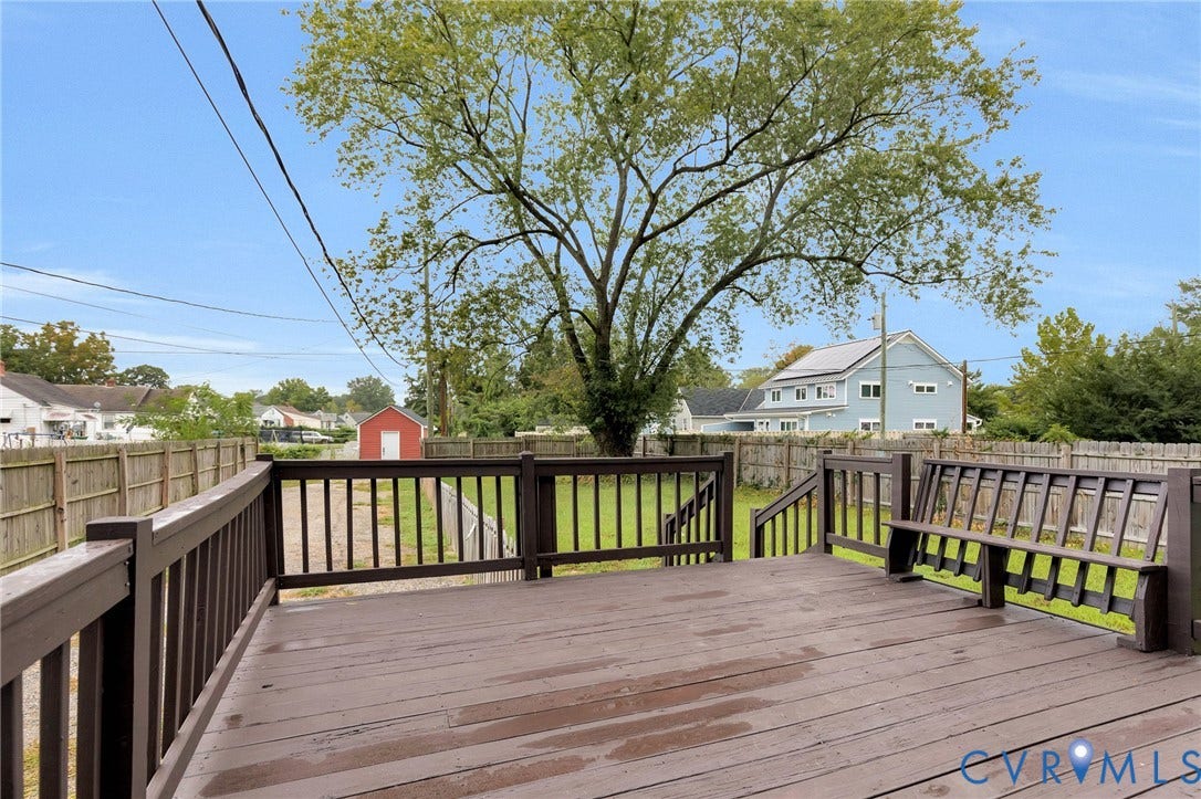 3504 Meadowbridge Road, Richmond, VA 23222 Spacious wood-finish deck with integrated seating and railing
