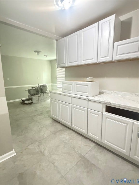 510 S Sycamore Street, Petersburg, VA 23803 White shaker-style cabinetry with a countertop, recessed lighting, and tile flooring