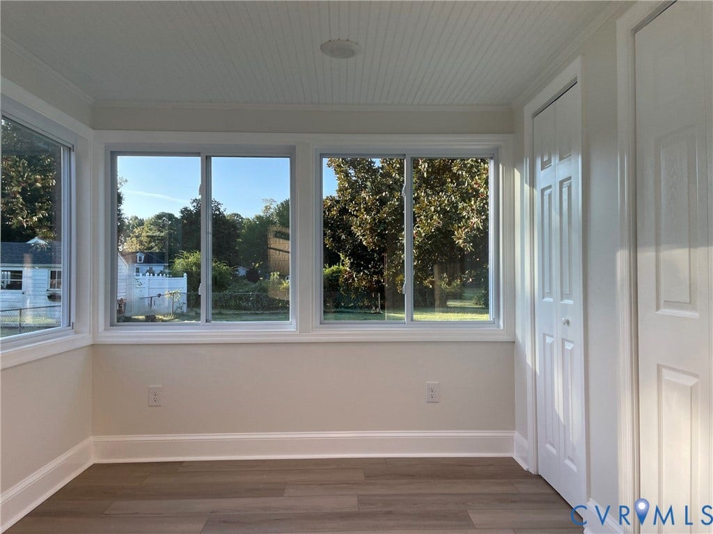 2315 Dee Kay Drive, Henrico, VA 23228 Wood-finish flooring, multiple pane windows, beadboard ceiling, and white panel doors