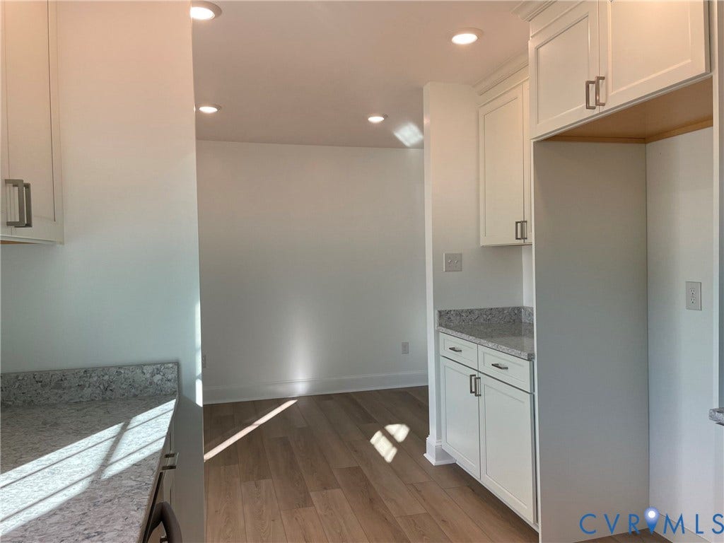 2315 Dee Kay Drive, Henrico, VA 23228 White shaker cabinetry with brushed nickel hardware, light-toned countertops, wood-finish flooring, and recessed lighting
