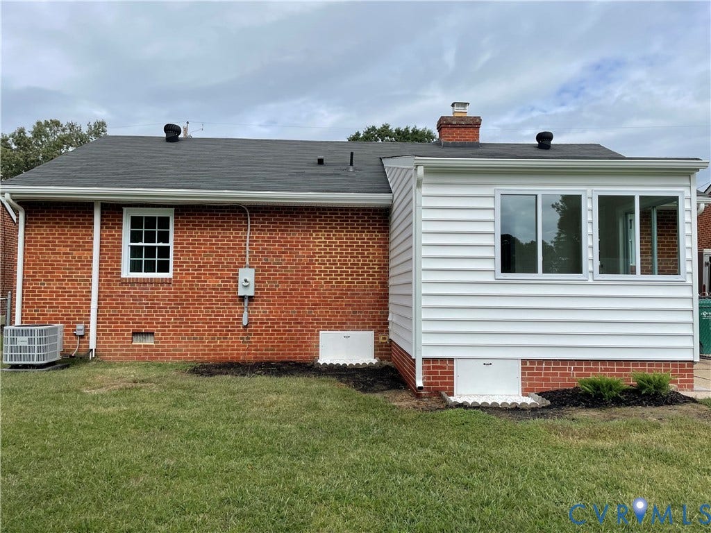 2315 Dee Kay Drive, Henrico, VA 23228 Brick and siding exterior with a dark shingle roof