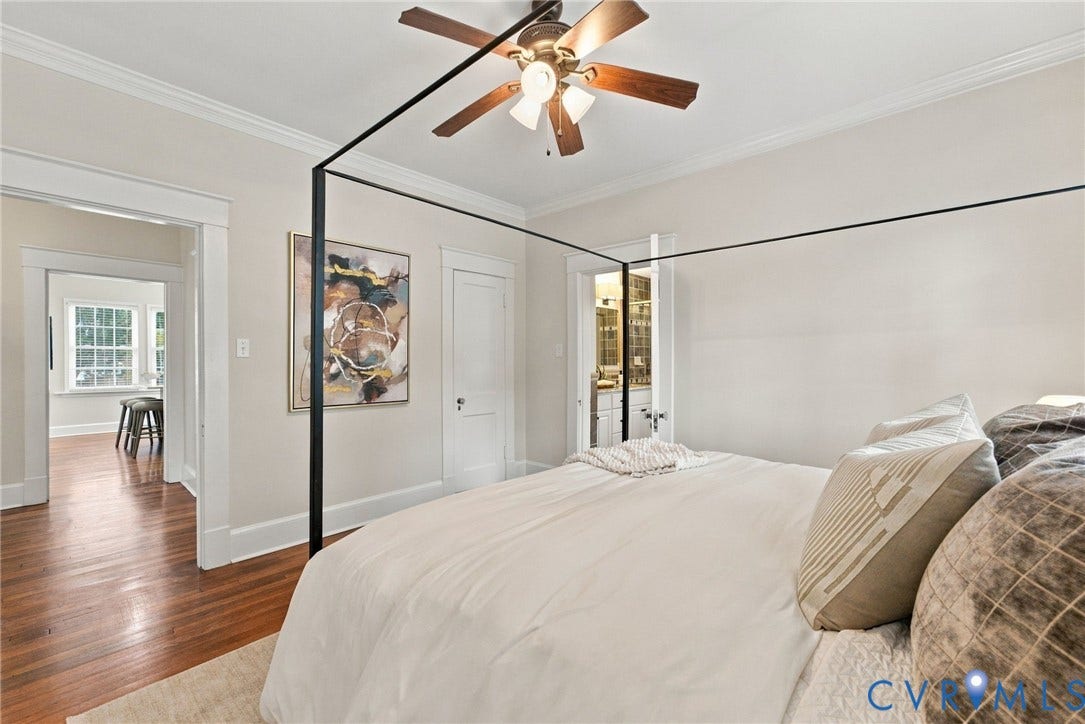4905 Patterson Avenue, Richmond, VA 23226 Hardwood flooring, crown molding, ceiling fan, and white walls