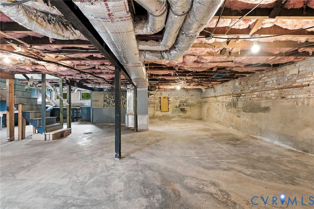 4905 Patterson Avenue, Richmond, VA 23226 Concrete flooring with exposed brick foundation