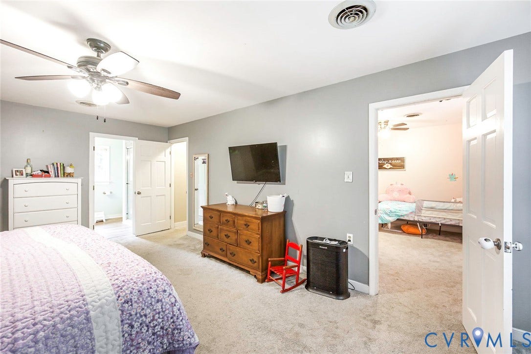 5640 Teterling Court, Lakewood Farms, Chester, VA 23831 Carpeted flooring, ceiling fan with integrated lighting, and a white paneled door
