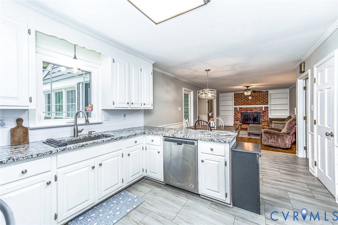 5640 Teterling Court, Lakewood Farms, Chester, VA 23831 Kitchen featuring white cabinetry, granite-style countertops, stainless steel appliances, and wood-finish flooring