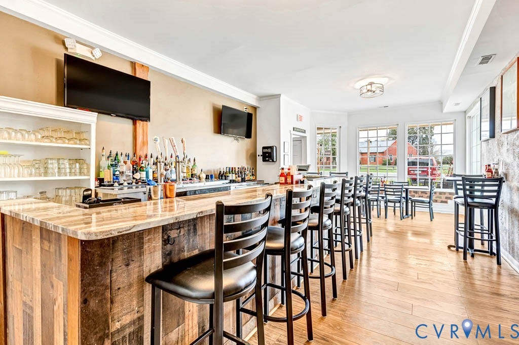 Custom built-in bar with a stone-finish countertop