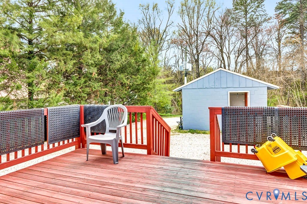 Wood deck with red railings