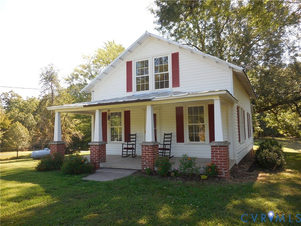 6507 Old Columbia Road, Columbia, Columbia, VA 23038 White siding exterior with red window shutters