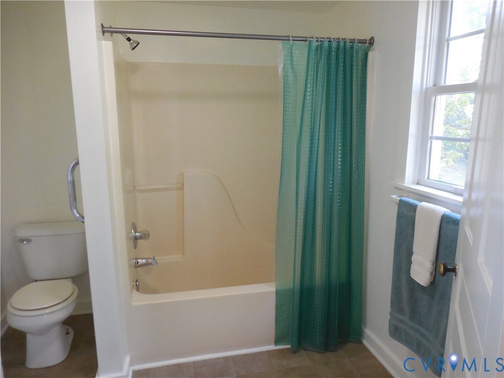 6507 Old Columbia Road, Columbia, Columbia, VA 23038 Tub and shower combination with chrome fixtures