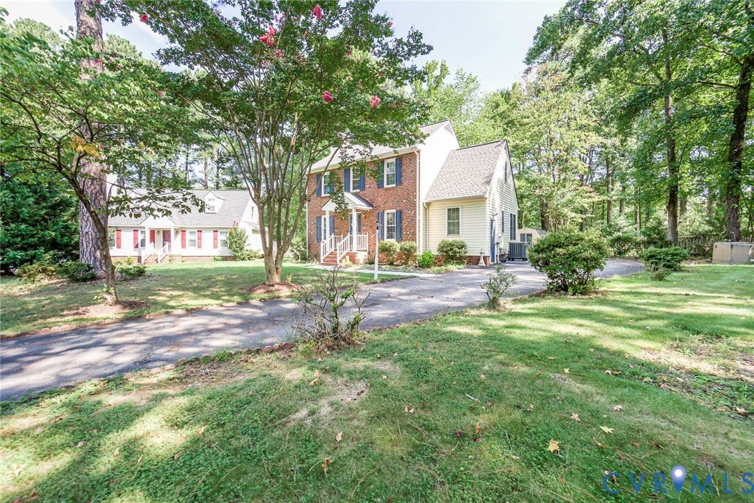 4605 English Cedar Court, Glen Allen, VA 23060 Brick exterior with contrasting shutters