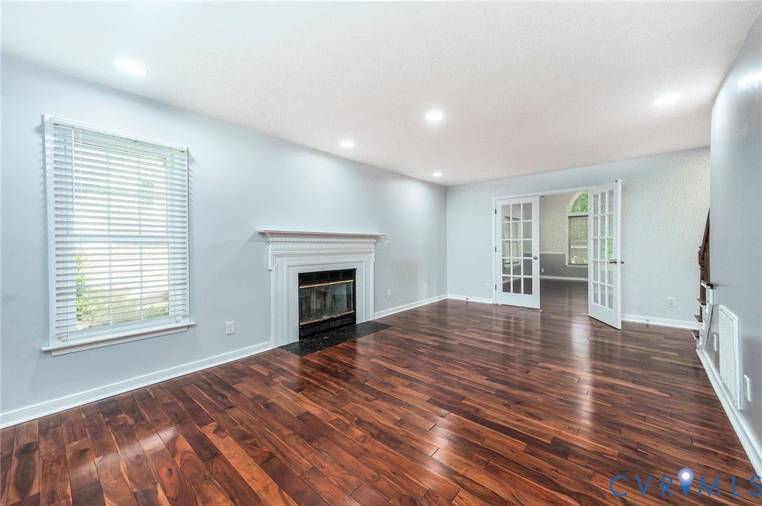 4605 English Cedar Court, Glen Allen, VA 23060 Hardwood flooring, fireplace with white mantel, recessed lighting, and white French doors