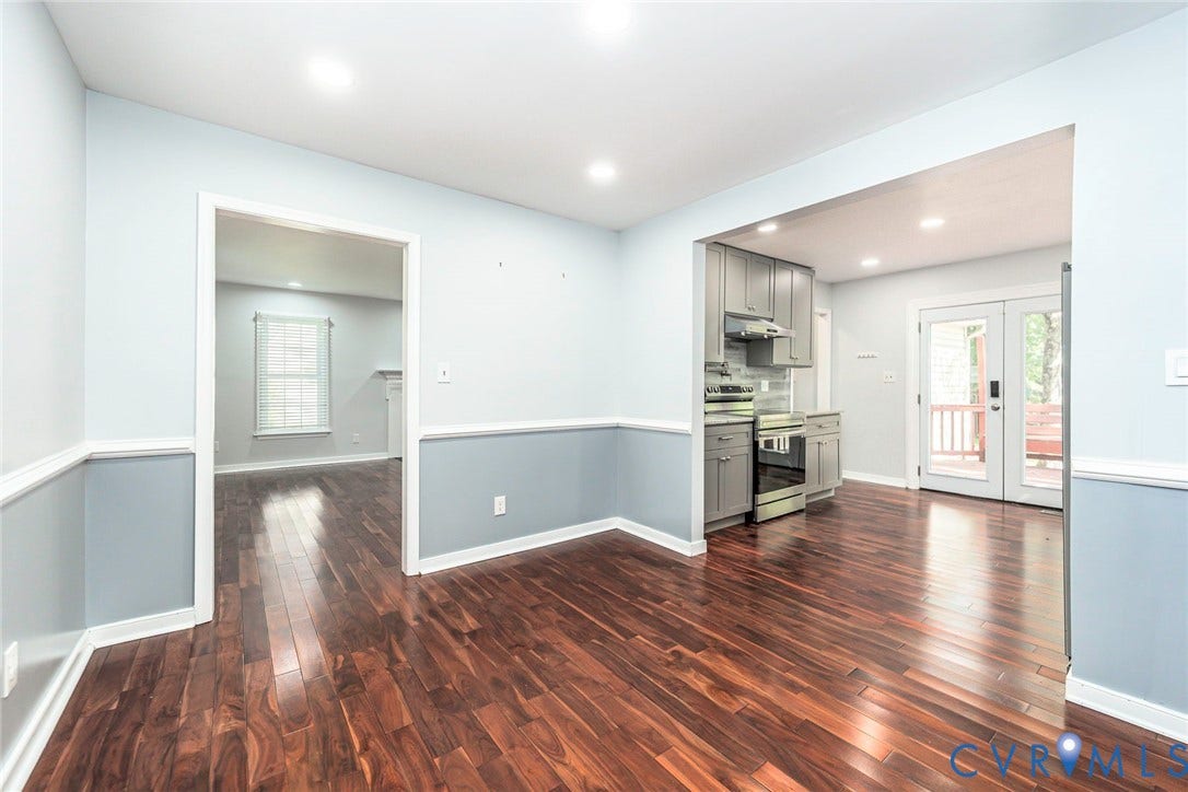 4605 English Cedar Court, Glen Allen, VA 23060 Hardwood flooring, two-tone wall finish, recessed lighting, and a kitchen with stainless steel appliances and shaker-style cabinetry