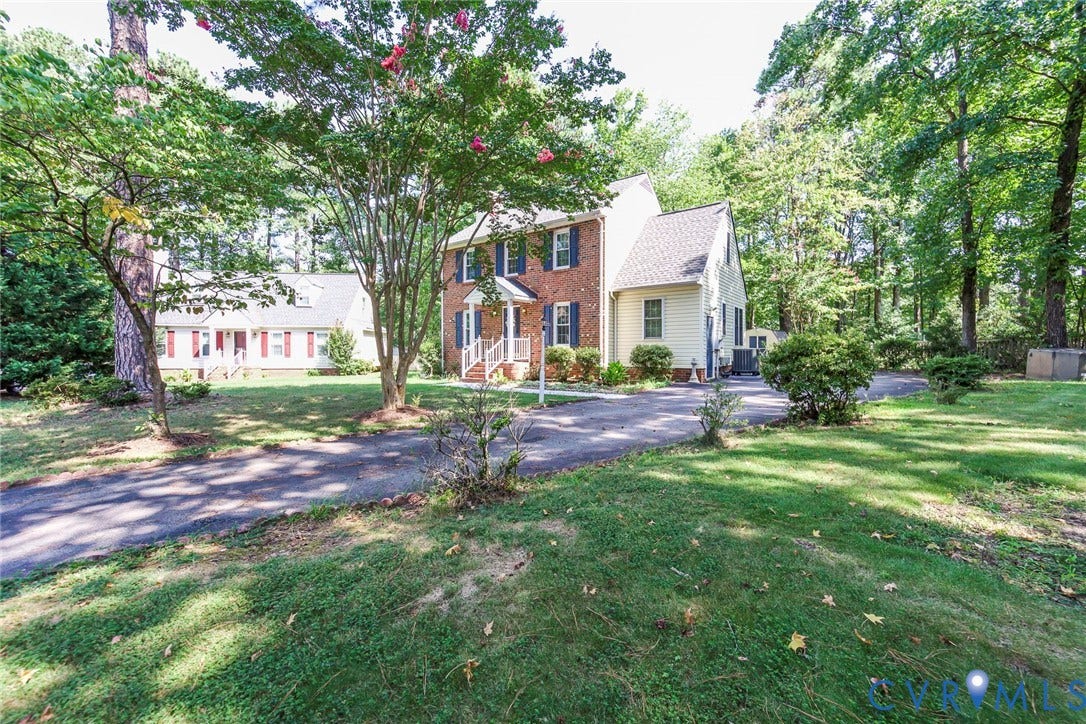 4605 English Cedar Court, Glen Allen, VA 23060 Brick and siding exterior with a gabled roof