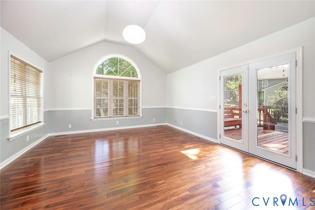 4605 English Cedar Court, Glen Allen, VA 23060 Vaulted ceiling, wood-finish flooring, arched window, French doors, and ceiling pendant light