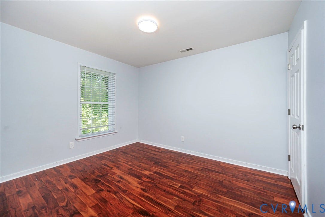 4605 English Cedar Court, Glen Allen, VA 23060 Hardwood-finish flooring, white trim, recessed lighting, and a window with horizontal blinds