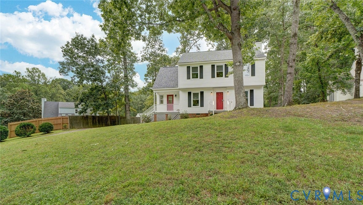 14 Redbridge Terrace, Shendoah Hills, Chesterfield, VA 23236 Set back beneath mature trees with a spacious front lawn and a peaceful, established setting.