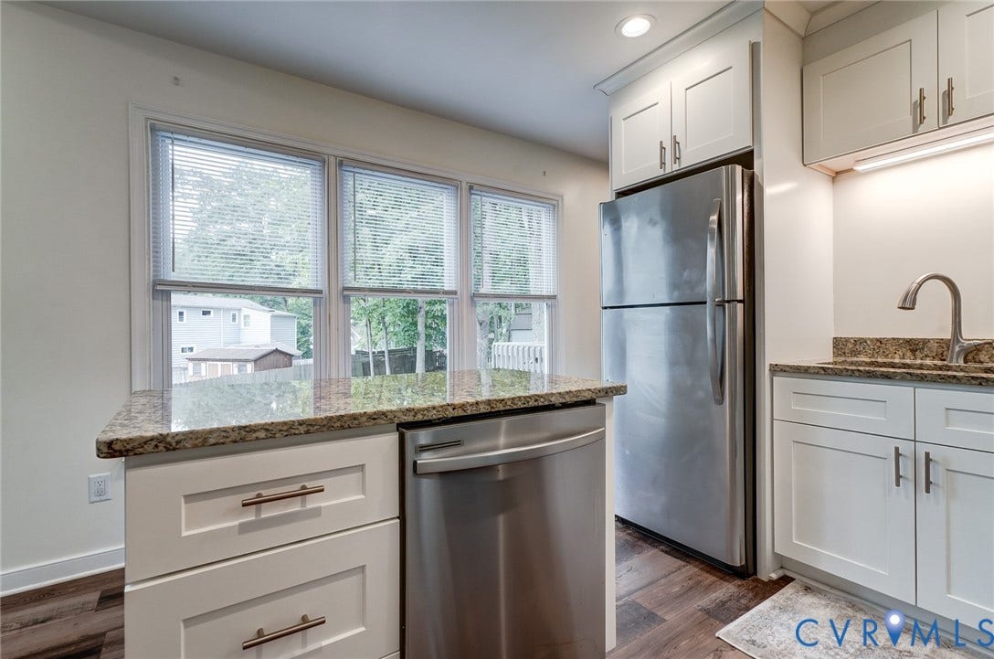14 Redbridge Terrace, Shendoah Hills, Chesterfield, VA 23236 Center island with additional storage and dishwasher, plus great natural light from the bank of windows.