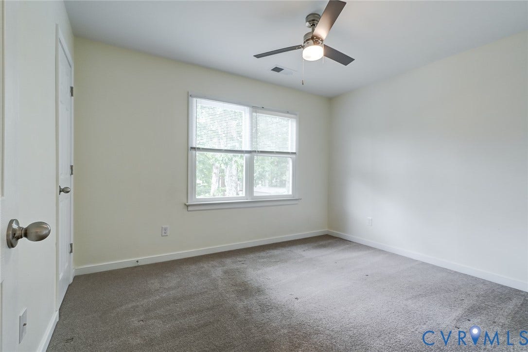 14 Redbridge Terrace, Shendoah Hills, Chesterfield, VA 23236 Bright secondary bedroom with ceiling fan, generous natural light and good closet space.