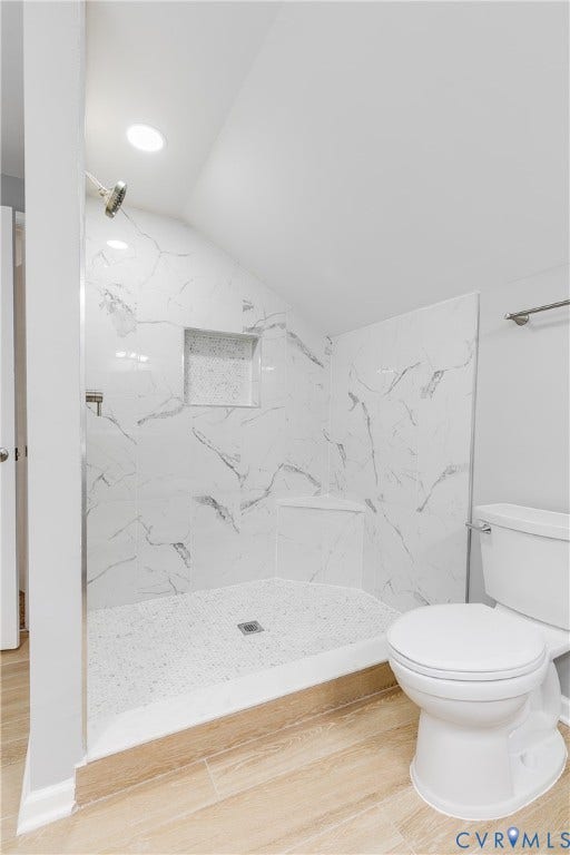 2012 Bailey Avenue, Richmond, VA 23231 White tile shower with built-in niche and seating, featuring a chrome shower head and white mosaic floor
