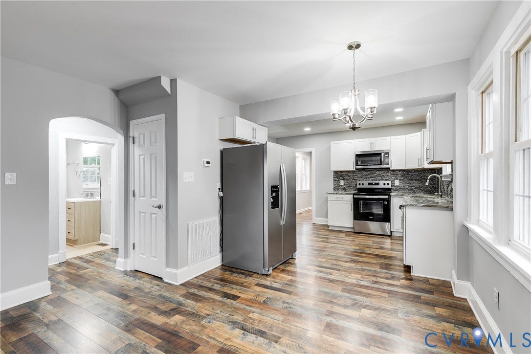 2012 Bailey Avenue, Richmond, VA 23231 Open-concept living space with wood-finish flooring, recessed lighting, and a modern chandelier