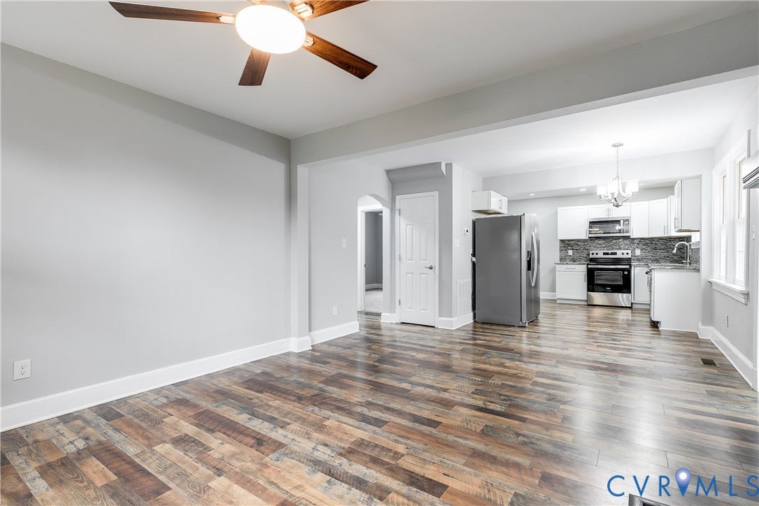 2012 Bailey Avenue, Richmond, VA 23231 Expansive interior with wood-finish flooring, light grey wall paint, and a ceiling fan