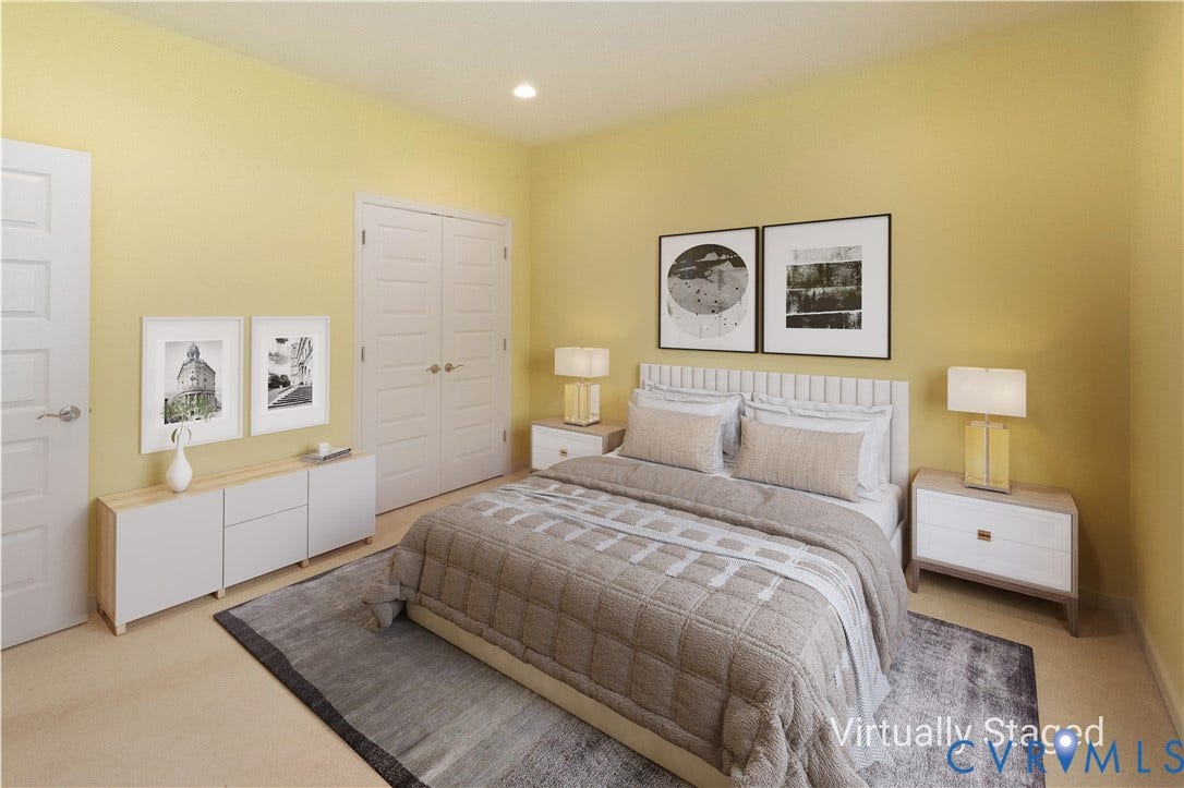 Recessed ceiling lighting, durable flooring, and a pair of white panel doors