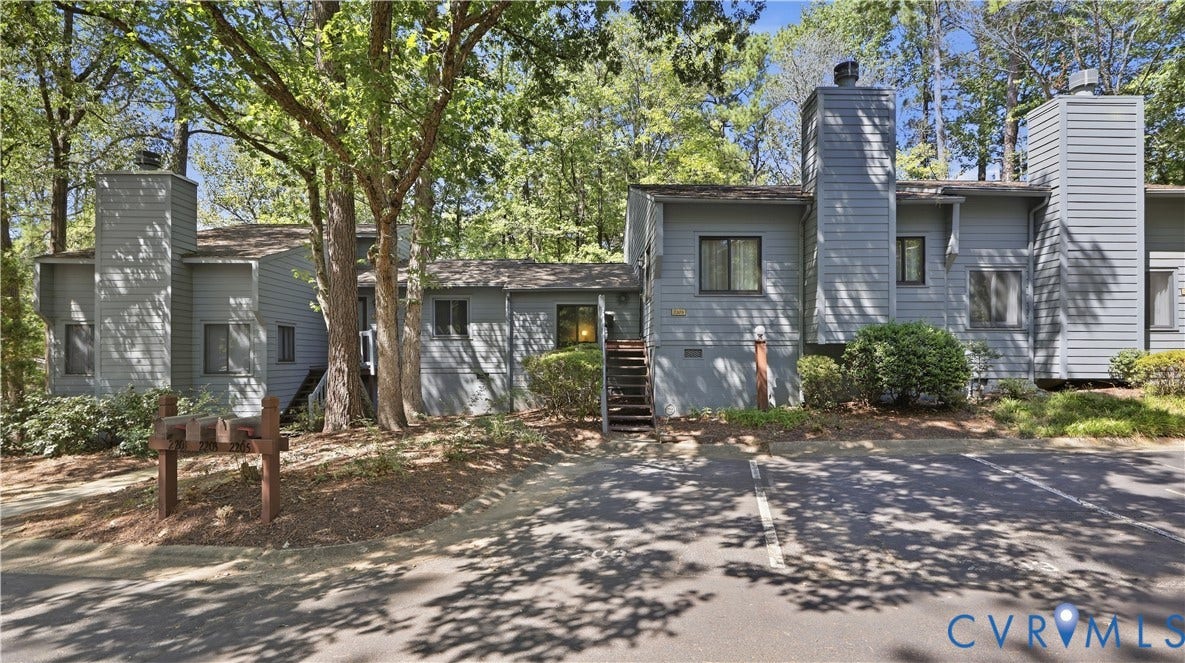 2203 Rockwater Terrace, Henrico, VA 23238 Siding exterior with multiple large chimneys