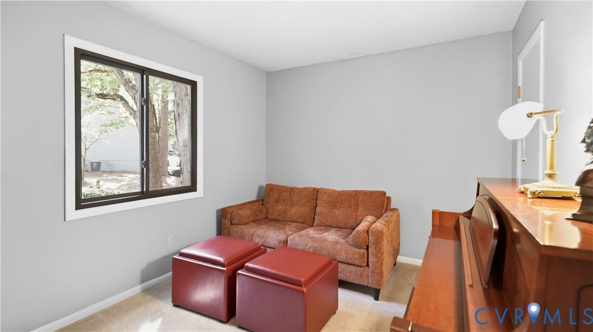2203 Rockwater Terrace, Henrico, VA 23238 Neutral wall paint, framed window, and carpeted flooring