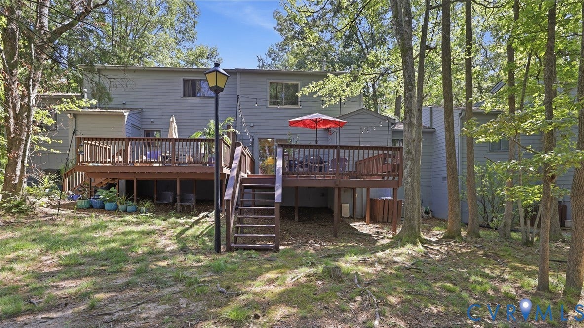 2203 Rockwater Terrace, Henrico, VA 23238 Expansive multi-level wood deck with wood railings, integrated exterior lighting, and direct exterior access