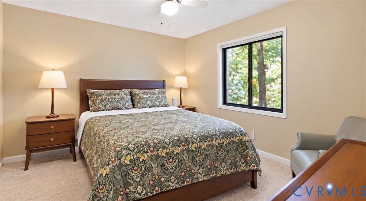 2203 Rockwater Terrace, Henrico, VA 23238 Neutral tone walls, carpet flooring, a single window with a black frame, and a ceiling fan