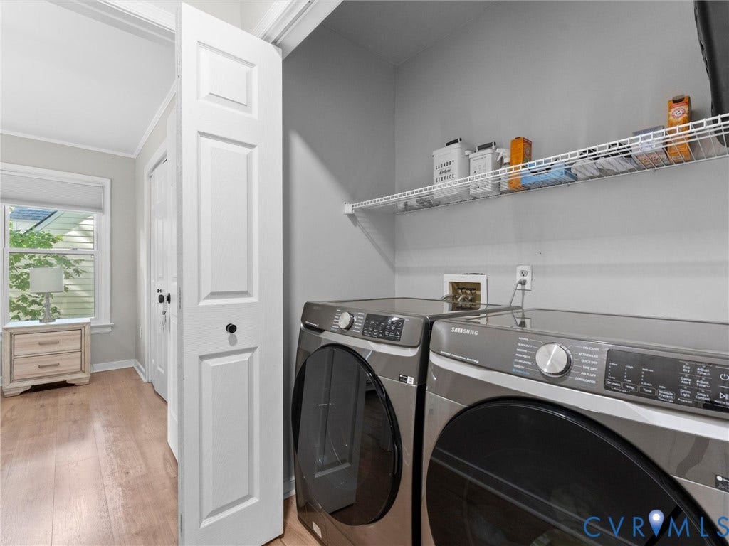Built-in laundry closet with wire shelving and paneled bi-fold doors