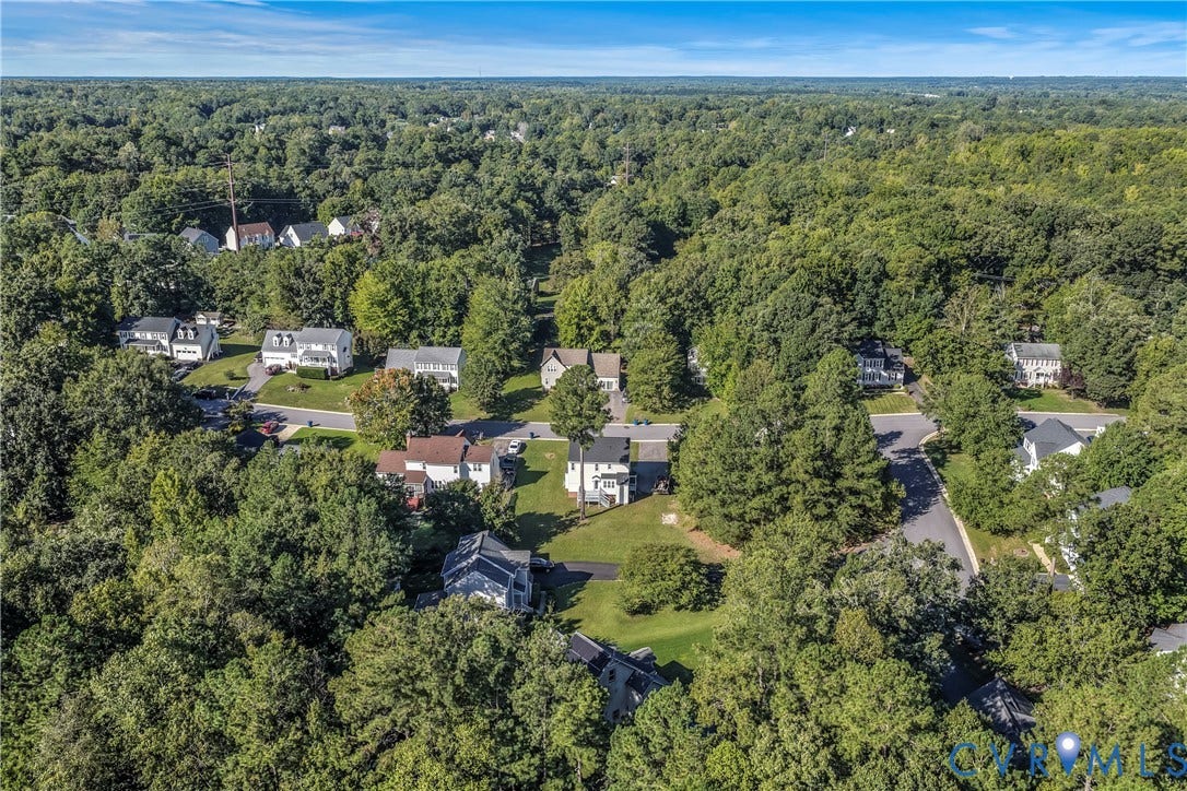 8414 Whirlaway Drive, Matoaca, Midlothian, VA 23112 Residential neighborhood featuring mature trees and paved streets