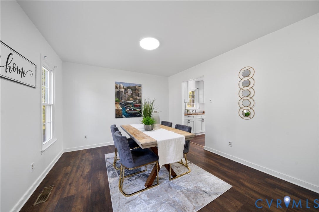 8414 Whirlaway Drive, Matoaca, Midlothian, VA 23112 Wood-finish flooring, white walls, double-hung window, and a circular ceiling light fixture