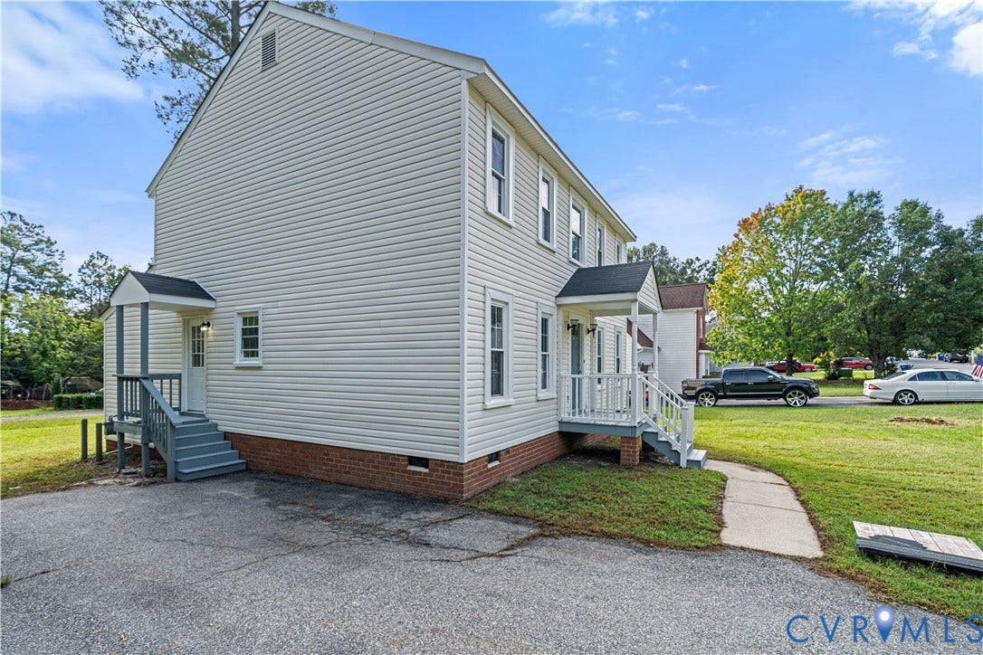 8414 Whirlaway Drive, Matoaca, Midlothian, VA 23112 Two-story exterior with light-colored siding