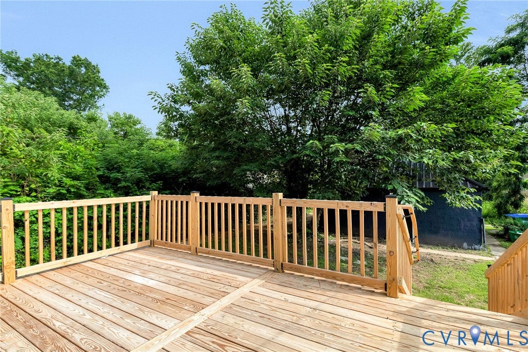 503 Pollock Street, Richmond, VA 23222 Expansive wood deck with natural wood railing and a gated entry