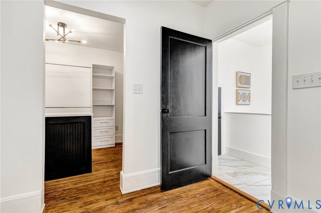 503 Pollock Street, Richmond, VA 23222 Wood-finish flooring, a contemporary ceiling light fixture, built-in shelving, and built-in drawers