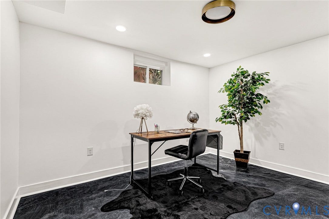 503 Pollock Street, Richmond, VA 23222 White walls with a single window, recessed lighting, and a modern brass-finish ceiling fixture