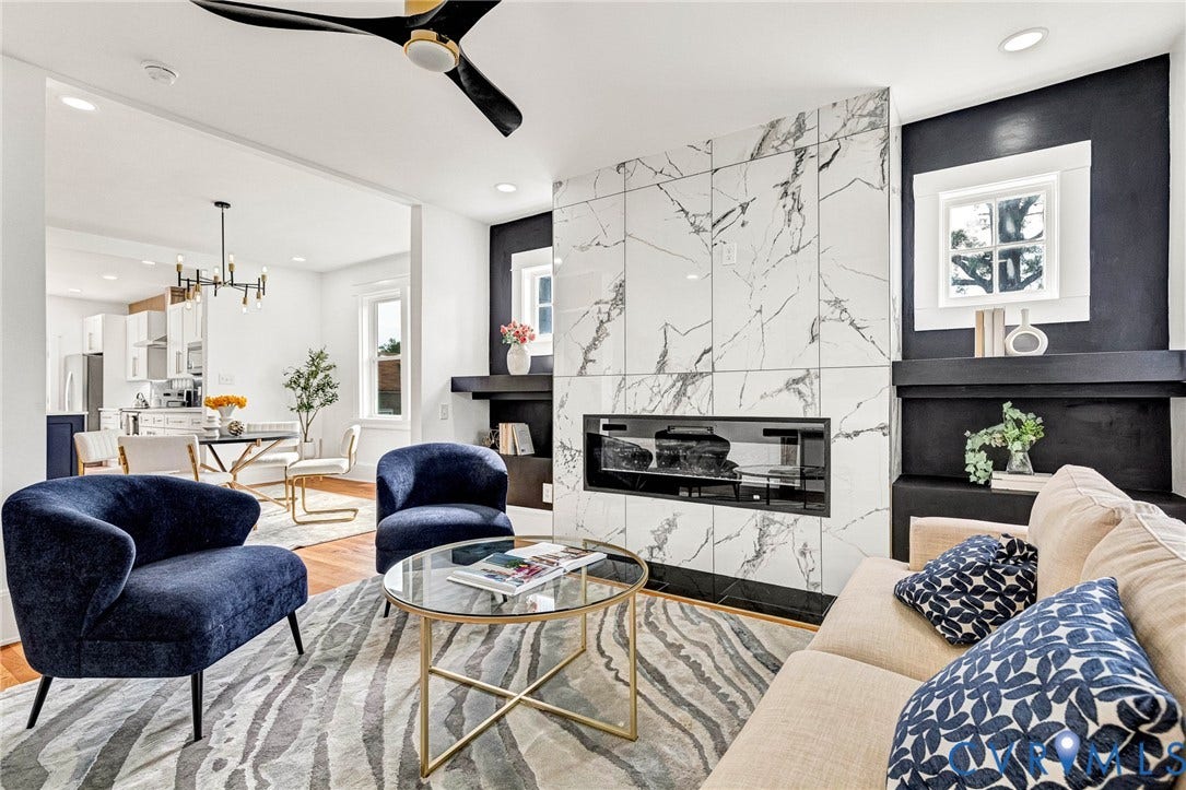 503 Pollock Street, Richmond, VA 23222 Modern linear fireplace with a stone-look surround, wood-finish flooring, and a contemporary ceiling fan