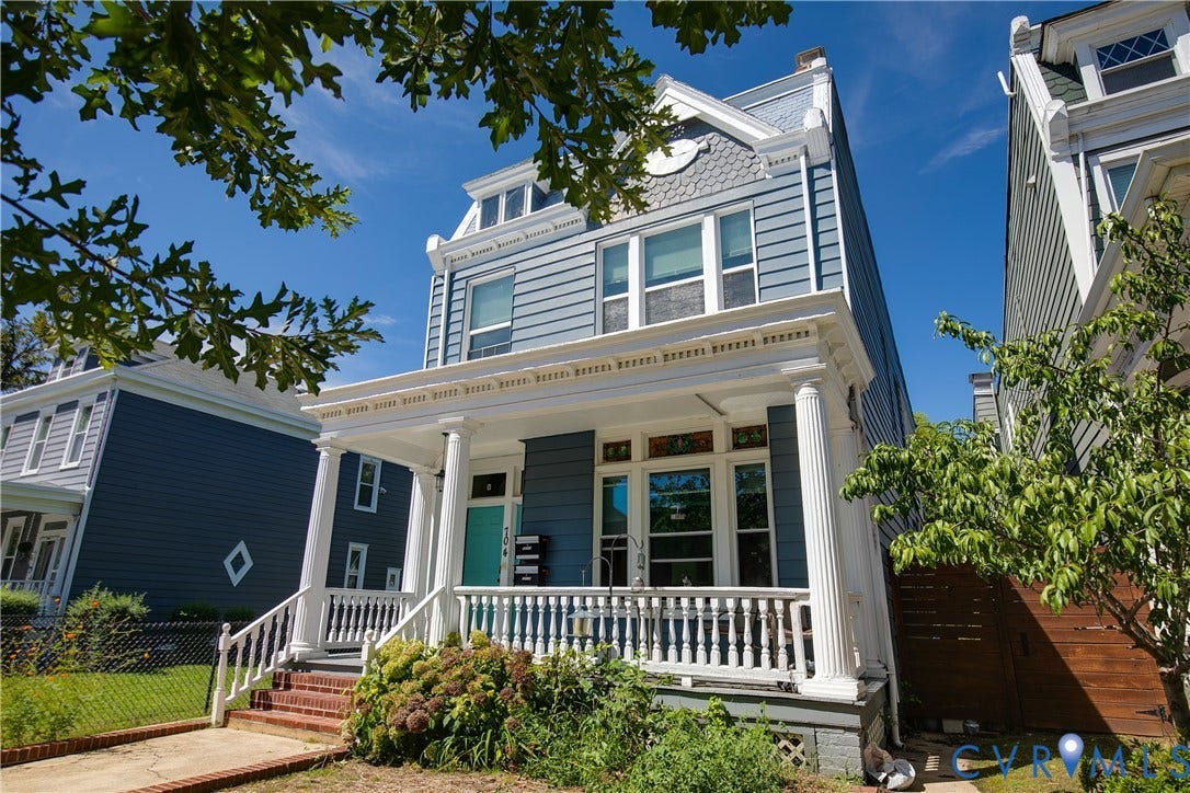 704 Chimborazo Boulevard, Chimborazo, Richmond, VA 23223 Two-story facade with light blue siding, white trim, and a full-width front porch