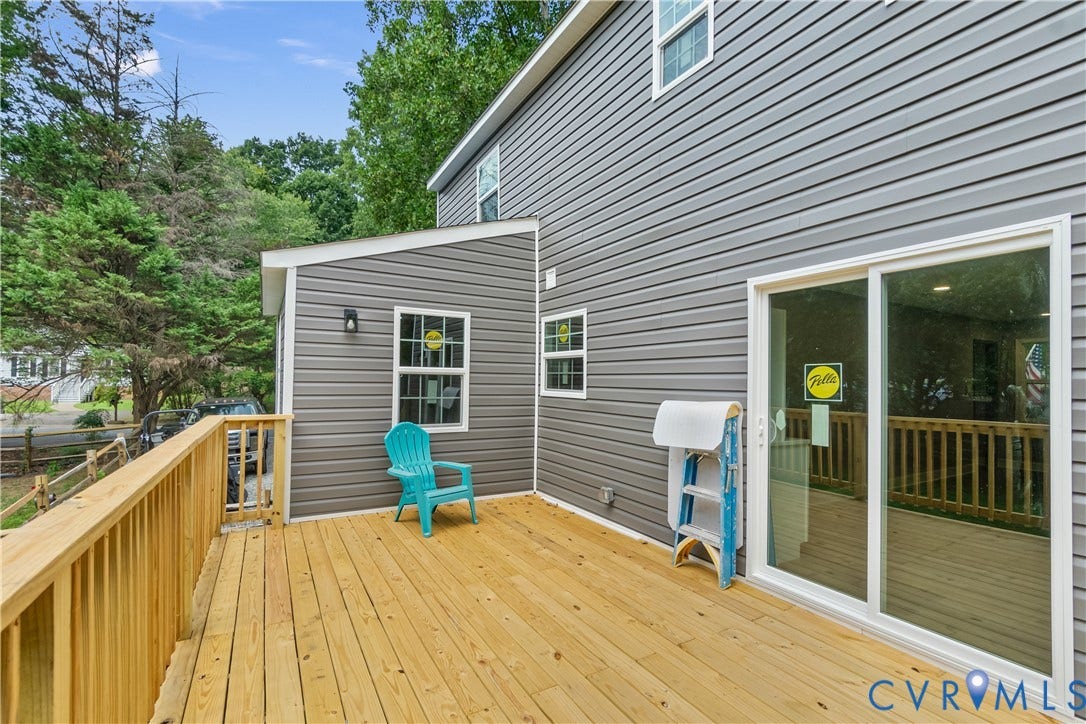 Wood-finish deck with a natural wood railing