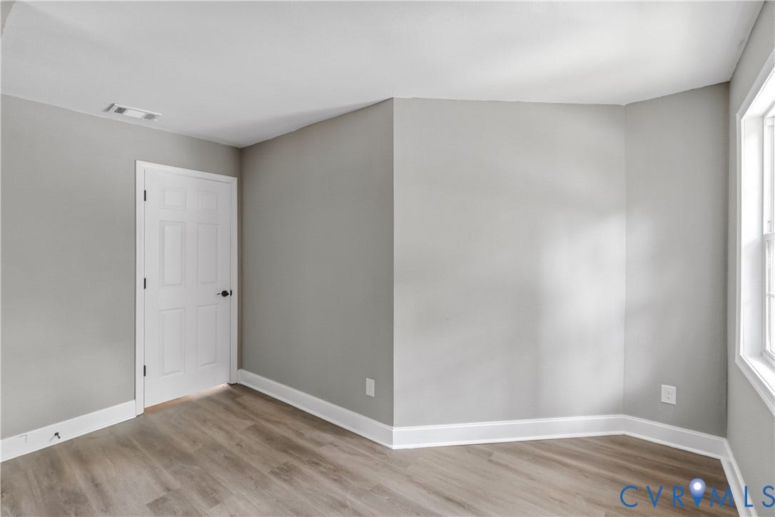Neutral paint palette with wood-finish flooring
