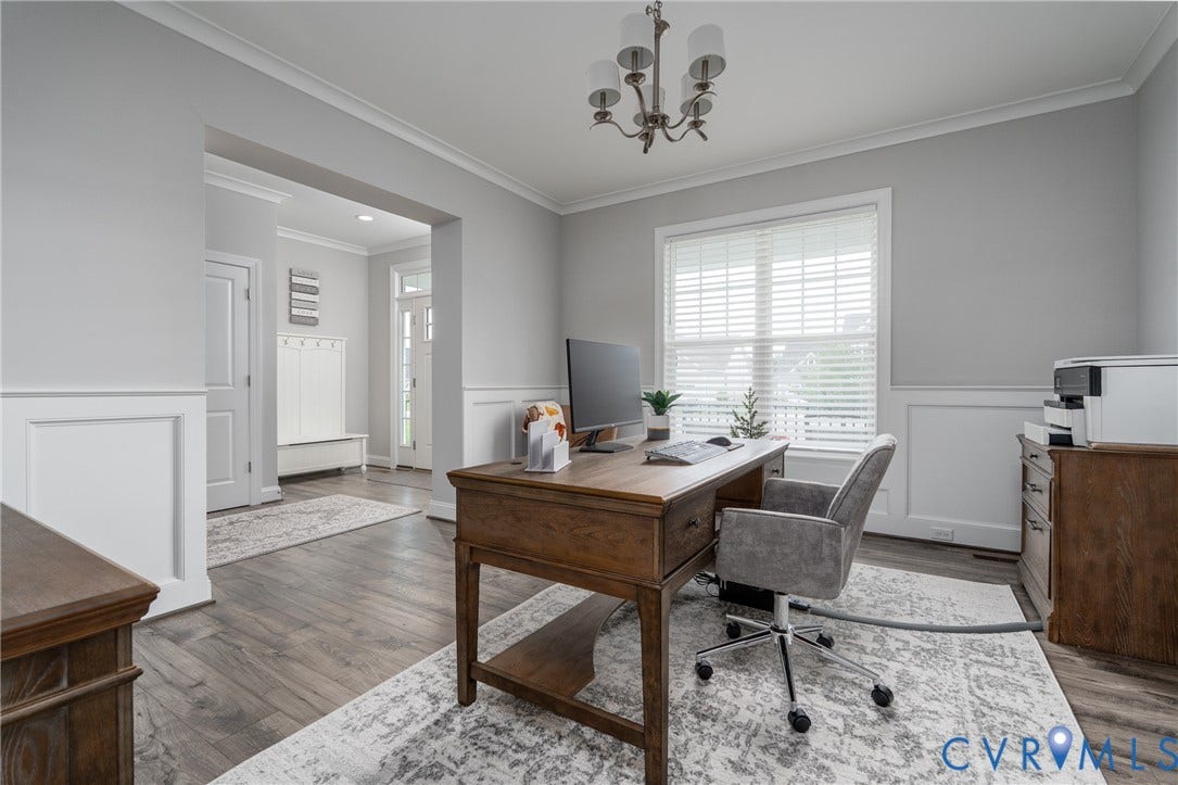 12303 Beech Hall Circle, Manakin Sabot, VA 23103 Hardwood-style flooring, wainscoting, crown molding, a multi-pane window with blinds, and an overhead chandelier with opaque shades