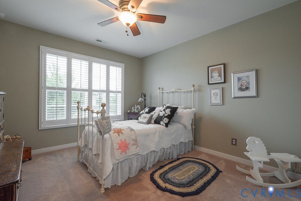 6301 Broad Sky Circle, Quiet, Mechanicsville, VA 23111 Room featuring wall-to-wall carpeting, white window shutters, and an overhead ceiling fan with lighting