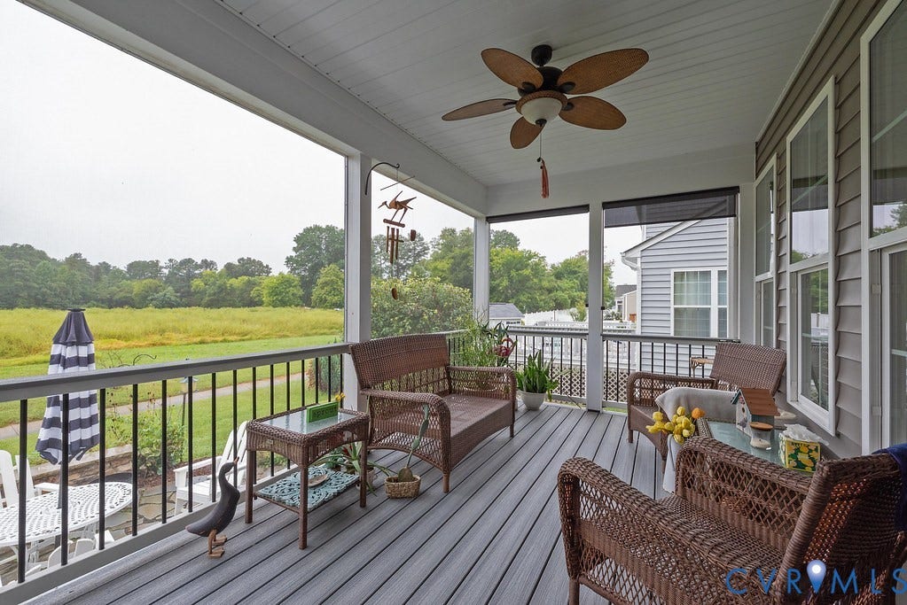 6301 Broad Sky Circle, Quiet, Mechanicsville, VA 23111 Spacious covered porch with composite decking, white ceiling, and a ceiling fan