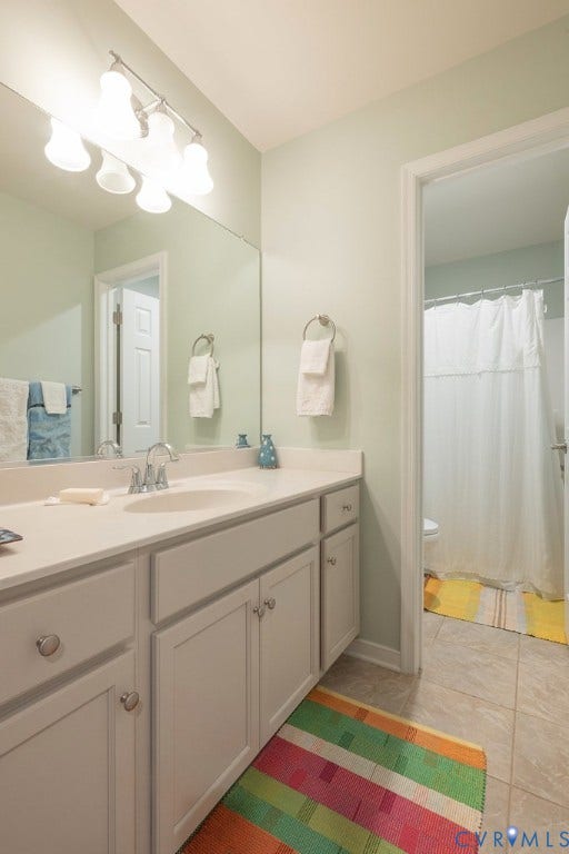 6301 Broad Sky Circle, Quiet, Mechanicsville, VA 23111 Double vanity with white cabinetry, light-toned countertop, and undermount sinks