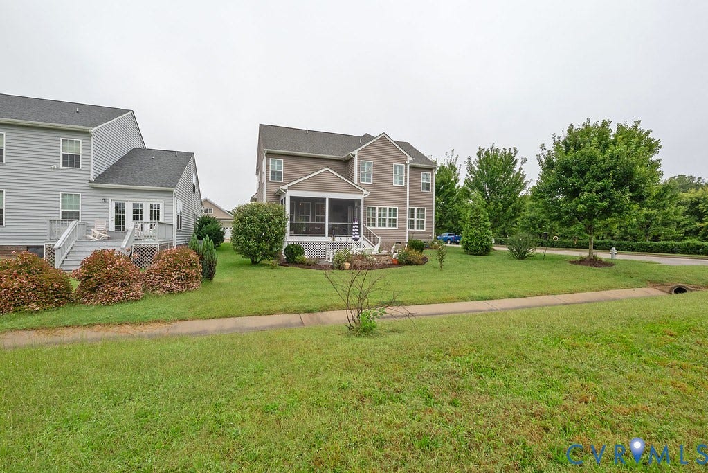 6301 Broad Sky Circle, Quiet, Mechanicsville, VA 23111 Two-story home with a screened porch and an exterior deck