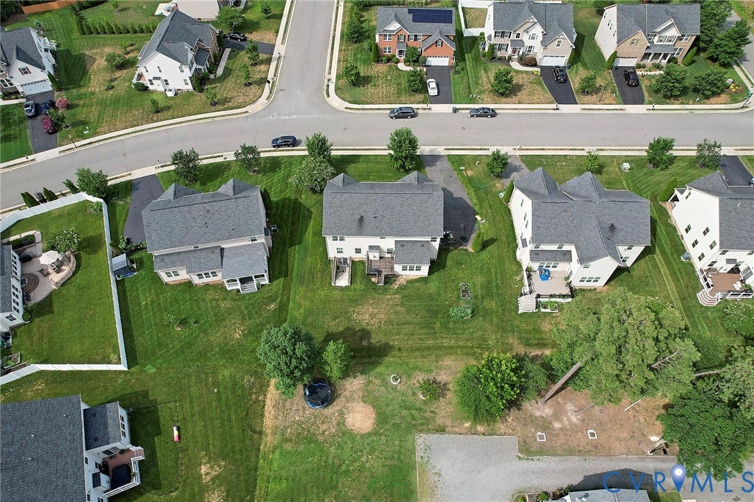 Expansive green lawns with established trees